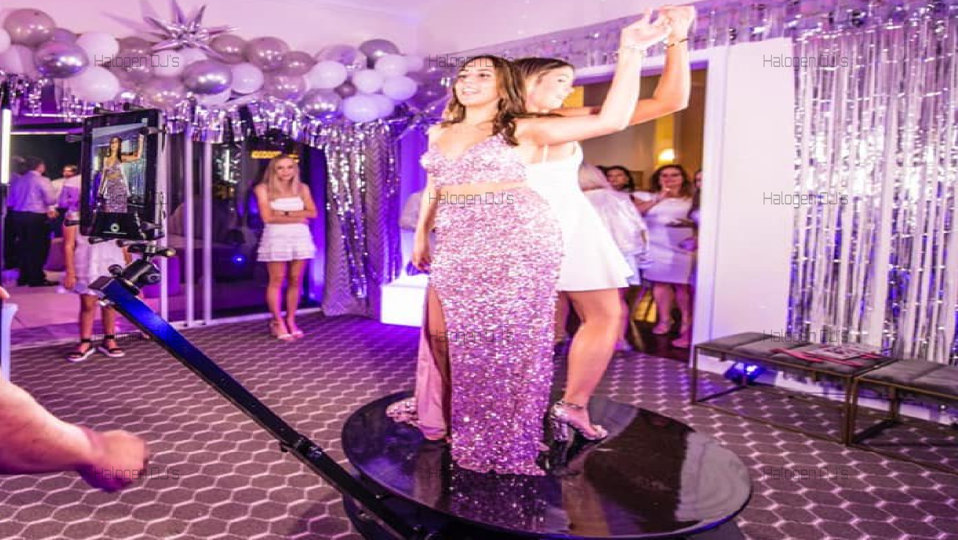 Click here to learn more about our Revolving Photo Booth services!
